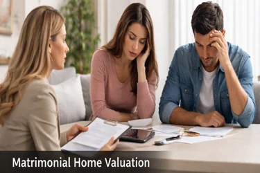 A couple consulting an appraiser for matrimonial home valuation
